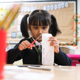 Girl cutting paper out